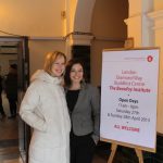 Volunteers welcome Lambeth residents at the door of the Beaufoy