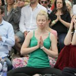 Buddhist students meditate at the fire ritual