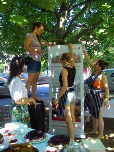 Setting up the Diamond Way cake stall at the Kennington Fete