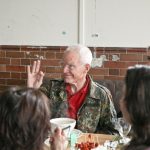 Lama Ole Nydahl enjoying lunch with his students